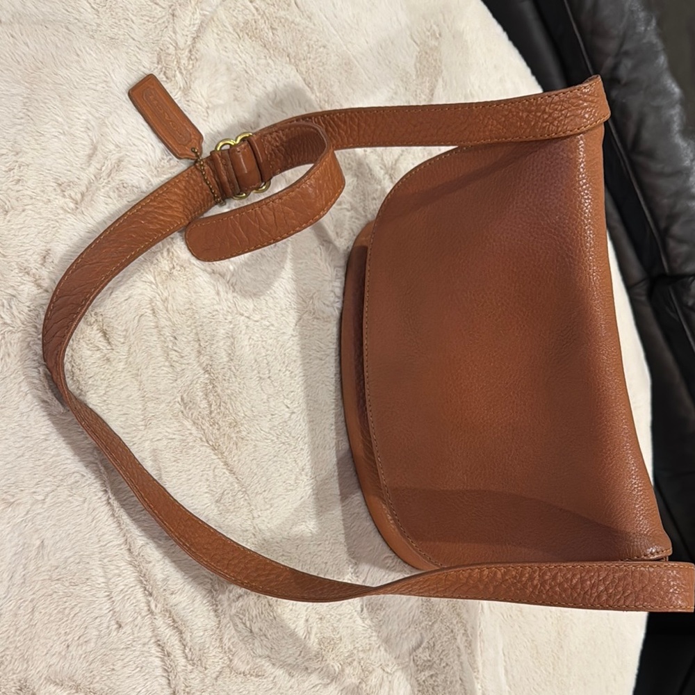 Coach Tan Shoulder Bag with Adjustable Strap and Flap Closure